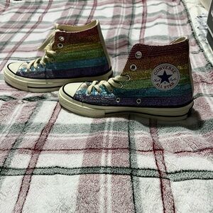 Converse Men or Women’s Hightop Pride Sneakers.